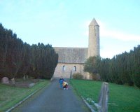 Saul Church: The present church, in 1933, replaced an earlier simpler building. The foundation stone records that it is on the site given to St. Patrick in AD 432. The new church commemorated the 1500 anniversary of that event, the start of Patrick's mission to the Gael. The stone was laid by Charles F. Darcy DD, Archbishop of Armagh on Ascension Day 1933. Photo - Pat Devlin CLICK FOR LARGER PICTURE